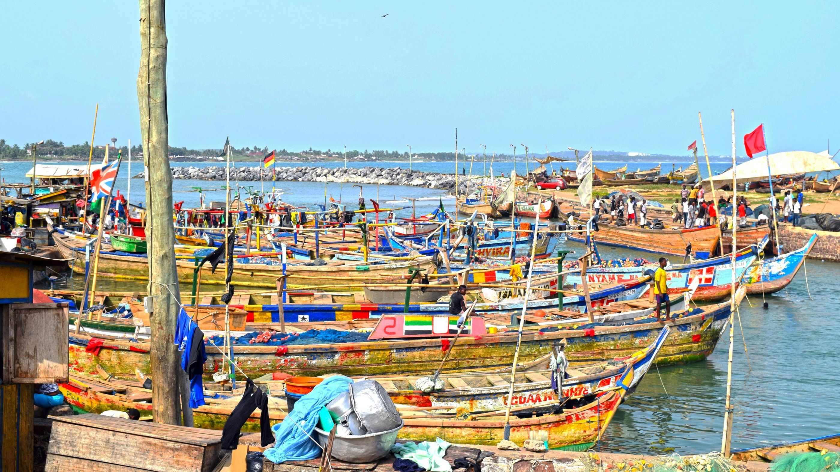 Colourful fishing canoes in a harbour in Ghana