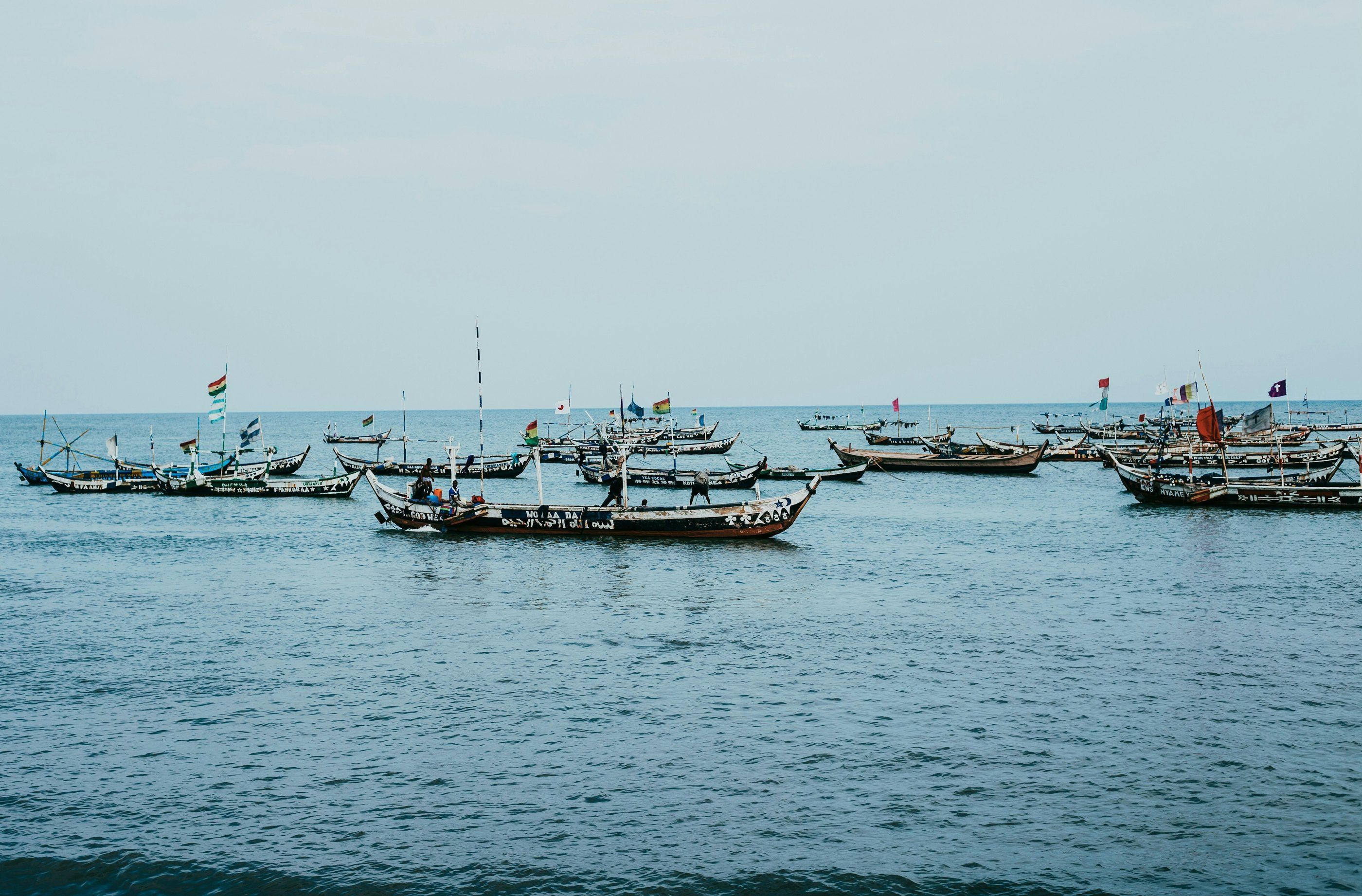 Fishing canoes at sea off the West African coast